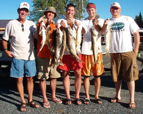 A group of sport fisherman at Agimac River Outfitters